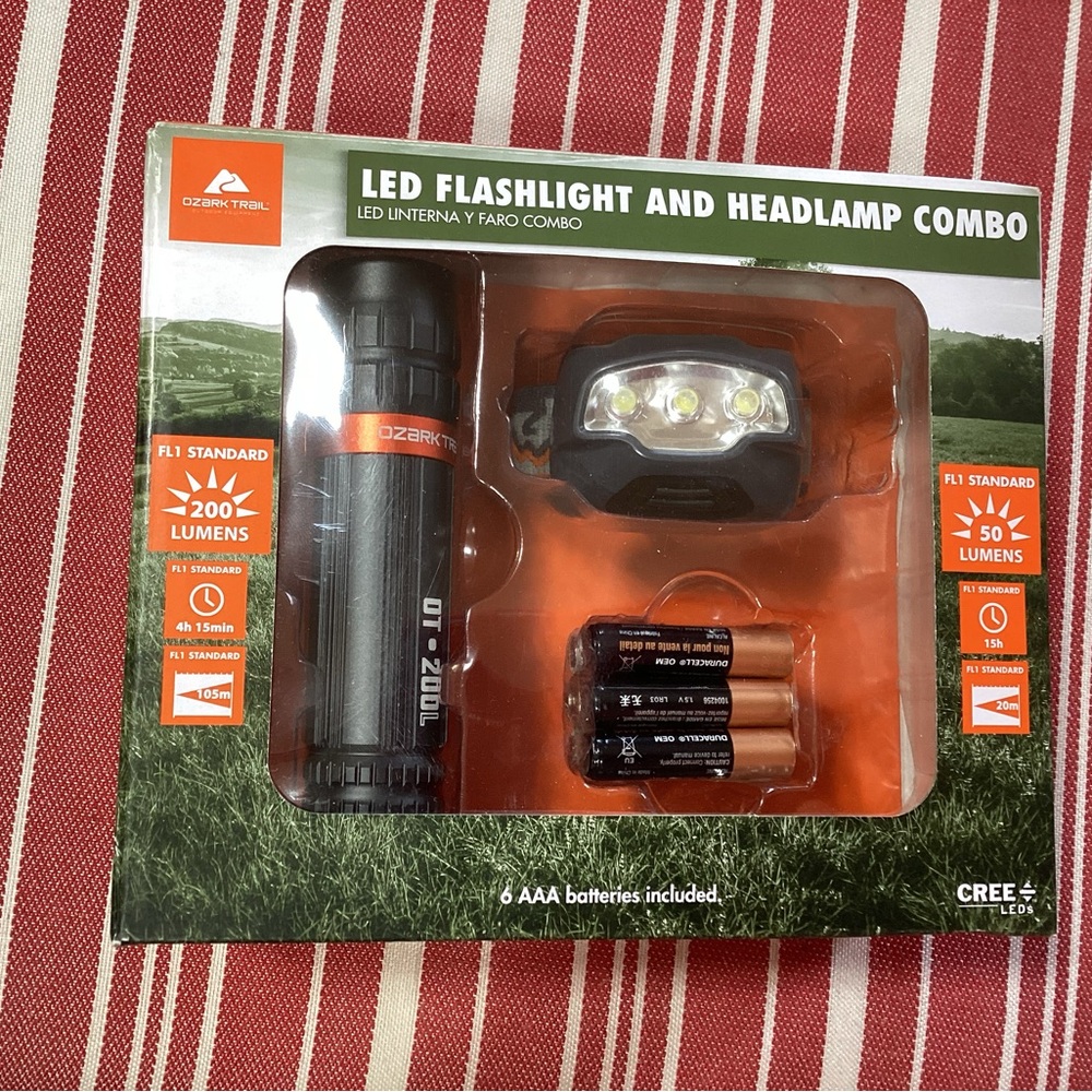 Ozark Trail new in box LED Flashlight and Headlamp Combo with 6 AAA batteries
